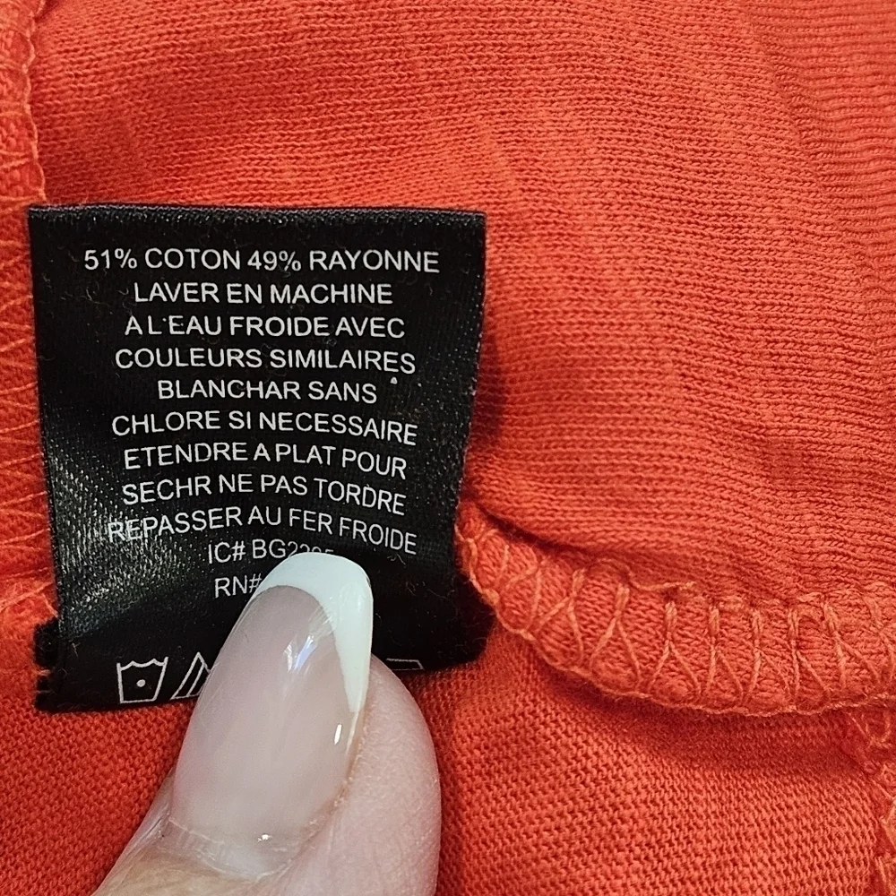 NWT ORANGE TOP SIZE MEDIUM